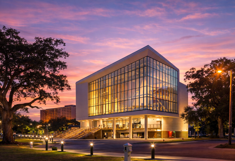 Twilight glow on sleek glass building